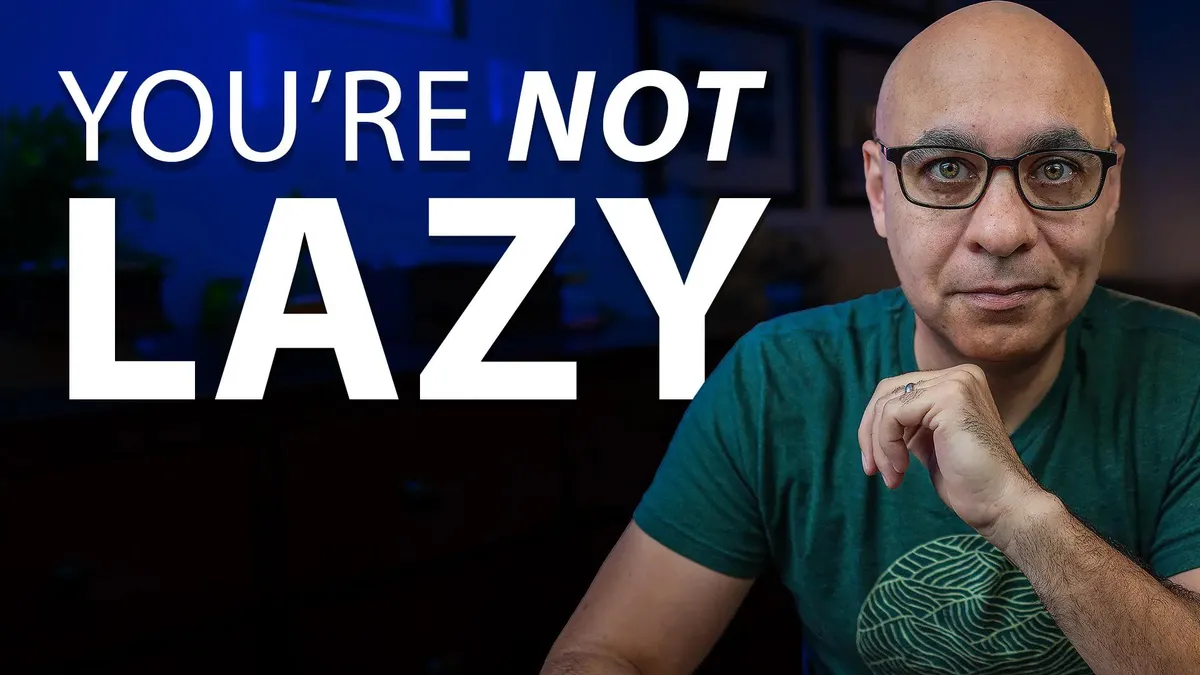 Determined man looking directly at camera with the words: you're not lazy